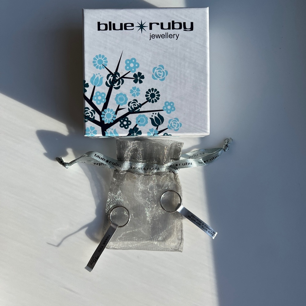 Blue Ruby silver bands